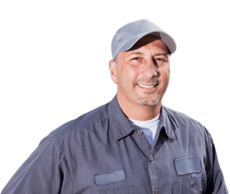 Company Truck Driver smiling in hat and work clothes.